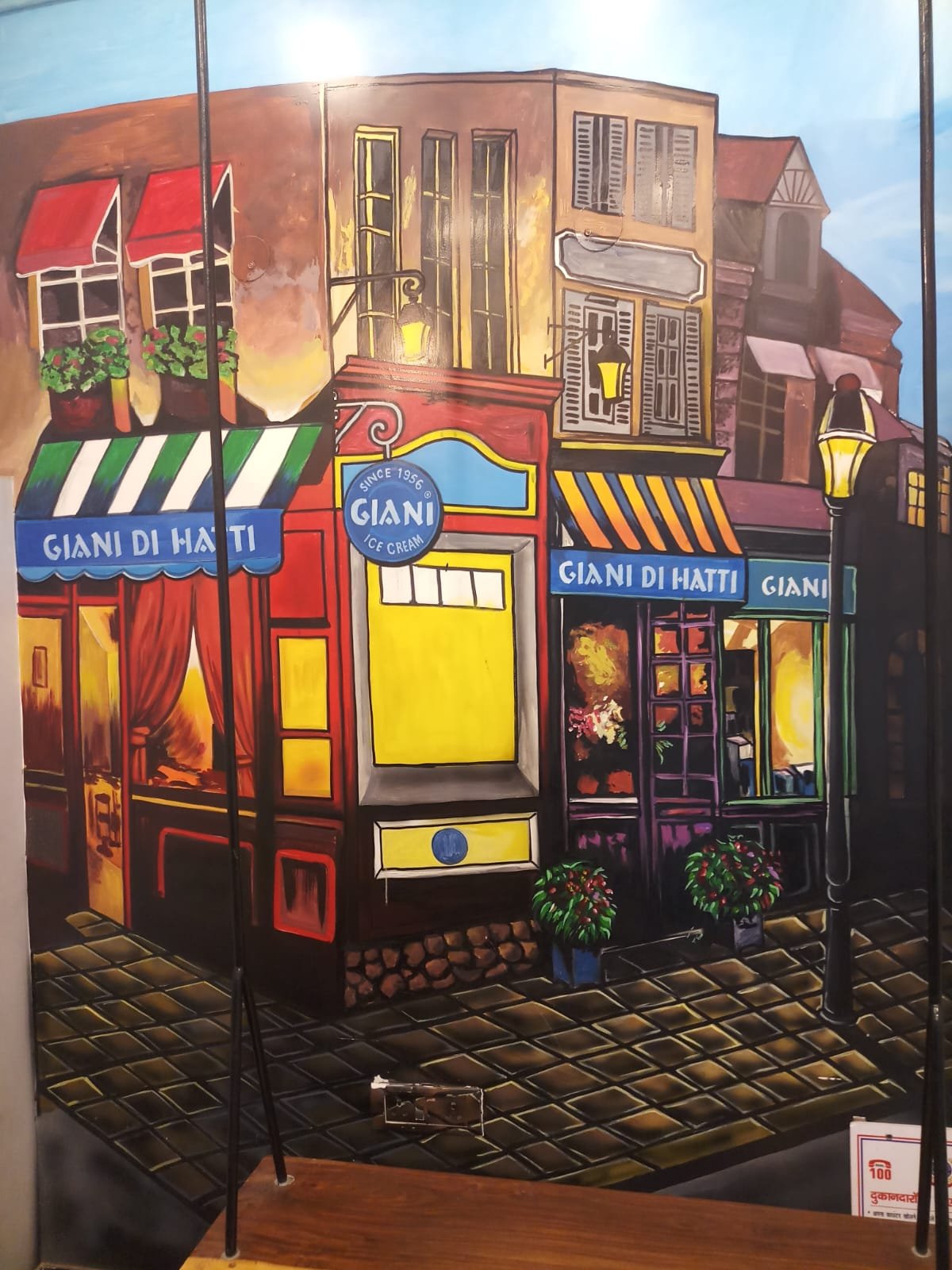 Colourful hand-painted storefront artwork